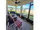 Relaxing screened patio, offering backyard views and outdoor seating at 3209 Casa Del Rey Ave, Kissimmee, FL 34746