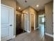 This bathroom features a walk in shower and doorway to a closet at 345 Gardenia Ct, Kissimmee, FL 34759