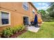 Backyard patio area with outdoor seating, a grill, and a view of the green space at 3658 Caruso Pl, Oviedo, FL 32765