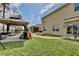 Backyard with a gazebo and fire pit, perfect for outdoor relaxation at 411 Lazio Cir, Debary, FL 32713