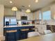 Bright kitchen featuring stainless steel appliances, a subway tile backsplash, and pendant lighting at 5017 Blue Hammock Ct, Kissimmee, FL 34746