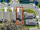 Aerial view of the property with the backyard and surrounding neighborhood highlighted at 5315 Meadow Song Dr, Okahumpka, FL 34762