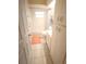 Bright bathroom with tub, shower, and tile flooring at 6065 Dory Way, Tavares, FL 32778