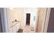 Bathroom featuring dual sinks, granite counters, walk in closet, and glass shower stall at 643 Taft Dr, Davenport, FL 33837