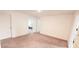 Bright and airy bedroom featuring neutral-toned carpet and ample closet space at 643 Taft Dr, Davenport, FL 33837