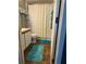 Compact bathroom featuring a shower, toilet, and vanity with cabinet space at 719 Del Ray Dr, Kissimmee, FL 34758