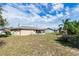 Expansive backyard with a screened porch, offering plenty of space for outdoor activities at 759 Swallow St, Deltona, FL 32725