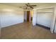 Bedroom featuring tiled floor, ceiling fan, and closet at 759 Swallow St, Deltona, FL 32725