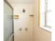 Close-up of shower featuring a shower head and tile at 759 Swallow St, Deltona, FL 32725