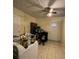 Laundry room featuring a ceiling fan, neutral walls, and tile floors at 2600 Elm Ave, Sanford, FL 32773