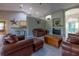 Spacious living room has an open floor plan, breakfast bar and easy access to the foyer at 1045 S State Road 415, New Smyrna Beach, FL 32168
