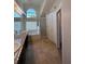 Primary bathroom with double sinks, soaking tub under large window, and walk-in shower at 14218 Squirrel Run, Orlando, FL 32828