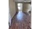 An expansive main bedroom with dark hardwood flooring and a spa-like bath at 14218 Squirrel Run, Orlando, FL 32828