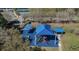 Aerial view of community playground with shade and blue rubber flooring at 14218 Squirrel Run, Orlando, FL 32828