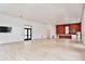Spacious clubhouse featuring a kitchenette, TV, and hardwood floors at 14384 Alafaya Oak Bnd, Orlando, FL 32828