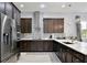 Modern kitchen featuring stainless steel appliances, stylish backsplash, and plenty of cabinets at 14384 Alafaya Oak Bnd, Orlando, FL 32828