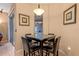 Cozy dining area with a marble-topped table and seating for four at 1562 Travertine Ter, Sanford, FL 32771