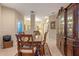 Inviting dining area with tile floors, neutral walls, and ample seating at 1562 Travertine Ter, Sanford, FL 32771