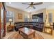 Spacious living room featuring a sectional sofa, and decorative rug at 1562 Travertine Ter, Sanford, FL 32771