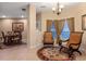 Inviting interior with tile floors, decorative rugs, neutral walls, and dining area at 1562 Travertine Ter, Sanford, FL 32771