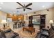 Open floor plan with ample seating and entertainment center at 1562 Travertine Ter, Sanford, FL 32771