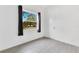 Bedroom showcases natural light, tiled floors, and window at 1612 Idaho Ave, Belle Isle, FL 32809