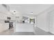 Bright, modern kitchen with stainless steel appliances and a stylish breakfast bar at 1612 Idaho Ave, Belle Isle, FL 32809