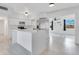 Bright kitchen with a large island, stainless steel appliances, and modern countertops at 1612 Idaho Ave, Belle Isle, FL 32809