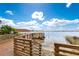 Stunning lake view from the wooden deck, providing a tranquil atmosphere and access to the waterfront at 1612 Idaho Ave, Belle Isle, FL 32809