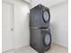 Stacked washer and dryer inside of laundry room at 1612 Idaho Ave, Belle Isle, FL 32809