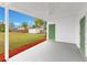 Large covered patio overlooks the backyard at 1612 Idaho Ave, Belle Isle, FL 32809