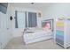Cozy bedroom with a neutral color scheme, window, and closet space at 1636 Barberry Dr, Kissimmee, FL 34744