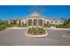 Well-maintained community center with ample parking and landscaped surroundings, offering residents a convenient gathering space at 1636 Barberry Dr, Kissimmee, FL 34744