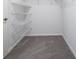 Walk-in closet with wire shelving providing ample storage space, enhancing organization and convenience at 1760 Astrid Rd, Davenport, FL 33837