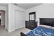 Clean bedroom with closet, dresser, and bed at 1795 Nw 44Th Ct Rd, Ocala, FL 34482