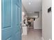 Inviting foyer with a custom storage and organization unit and neutral color palette at 1795 Nw 44Th Ct Rd, Ocala, FL 34482