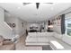 Comfortable living area with a view to the kitchen and an adjacent dining space at 1795 Nw 44Th Ct Rd, Ocala, FL 34482