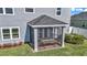 Cozy screened-in patio with brick flooring at 1795 Nw 44Th Ct Rd, Ocala, FL 34482