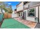Townhouse backyard with patio and small grassy area at 1838 Warringwood Dr # B-3, Orlando, FL 32839