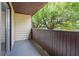 Cozy outdoor balcony with views of green trees at 1838 Warringwood Dr # B-3, Orlando, FL 32839