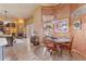 Cozy dining area featuring a view of the backyard pool, perfect for casual meals at 2368 Buckingham Run Ct, Orlando, FL 32828