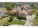 Stunning, spacious home featuring lush landscaping, a screened pool, and a tile roof in a desirable neighborhood at 2368 Buckingham Run Ct, Orlando, FL 32828