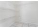Walk in closet equipped with plenty of wire shelving at 2665 Windsor Heights St, Deltona, FL 32738