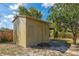 Exterior view of shed with a ramp and covered area at 2665 Windsor Heights St, Deltona, FL 32738