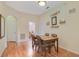 The dining area features a light color scheme and views to the other rooms at 3050 Pirates Retreat Ct # 402, Kissimmee, FL 34747