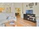 Open-concept living room with a dining area, seamlessly connected to the kitchen, creating an inviting space at 3050 Pirates Retreat Ct # 402, Kissimmee, FL 34747