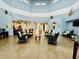 Community lounge area with comfortable seating and attractive decor at 3050 Pirates Retreat Ct # 402, Kissimmee, FL 34747