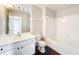 Well-lit bathroom showcasing a vanity with sink, toilet, and bathtub with shower, all in a clean, modern design at 4280 Summer Landing Dr # 204, Lakeland, FL 33810