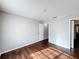 Bedroom with laminate wood floors and open door to a walk-in closet at 4280 Summer Landing Dr # 204, Lakeland, FL 33810