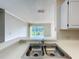 Stainless steel kitchen sink with a view of the porch and backyard at 4280 Summer Landing Dr # 204, Lakeland, FL 33810